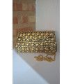 clutch negro y dorado